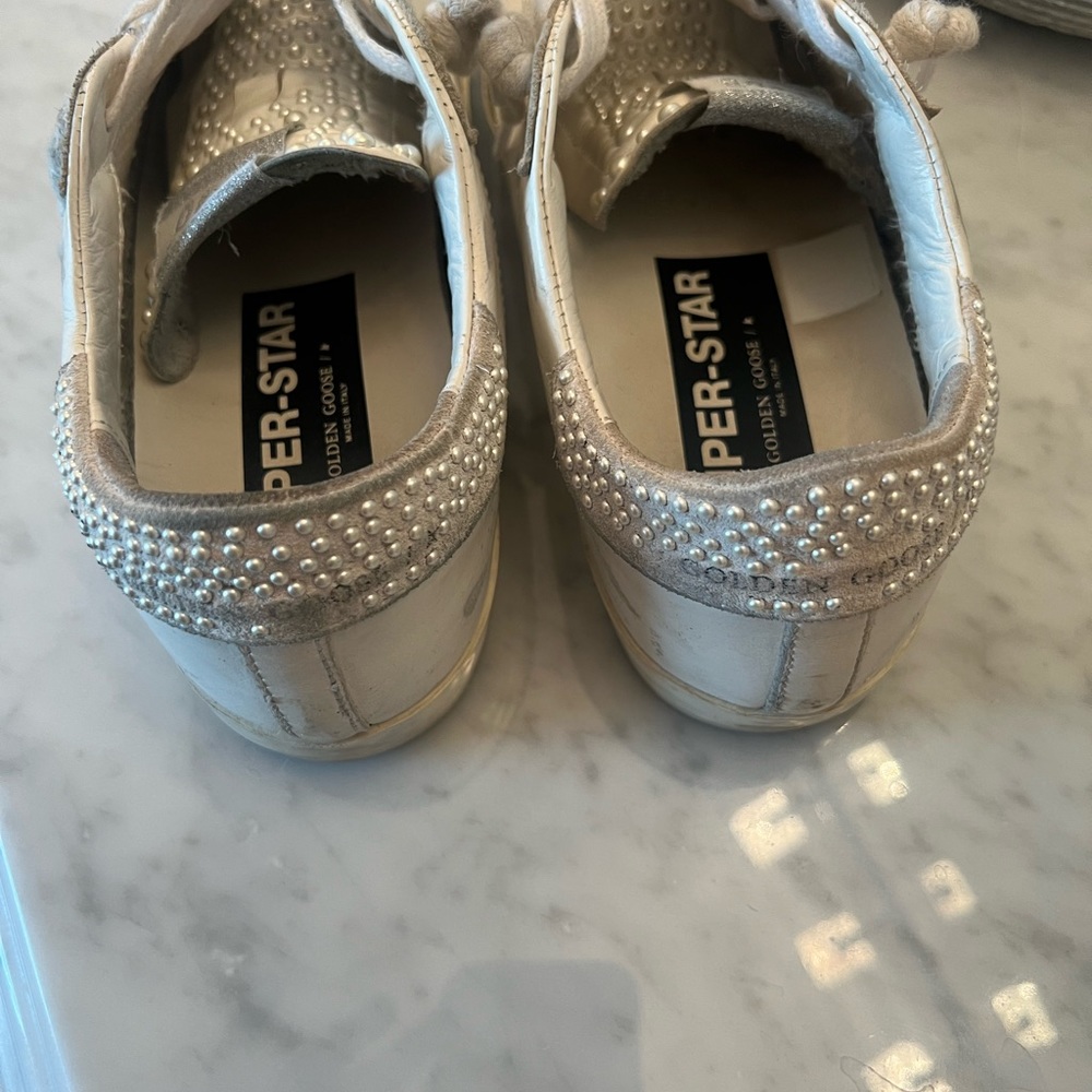 Golden goose size 38 pd $700 taken care of but worn